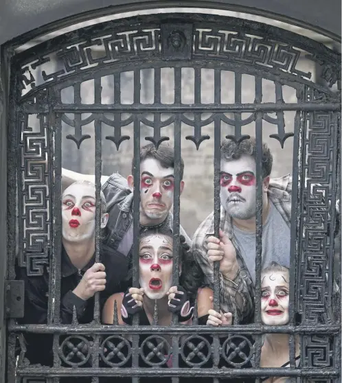  ?? ?? Clowns from the production of Good Grief, at Greyfriars Kirkyard in Edinburgh but many performers fear they can no longer afford to take part in the festivals