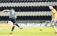  ??  ?? Big goal Jon Obika scores against Partick Thistle