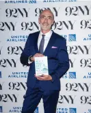  ?? Photograph: Christophe­r Smith/Invision/AP ?? Arthur Brooks poses with his new book on 12 September 2023 in New York City.