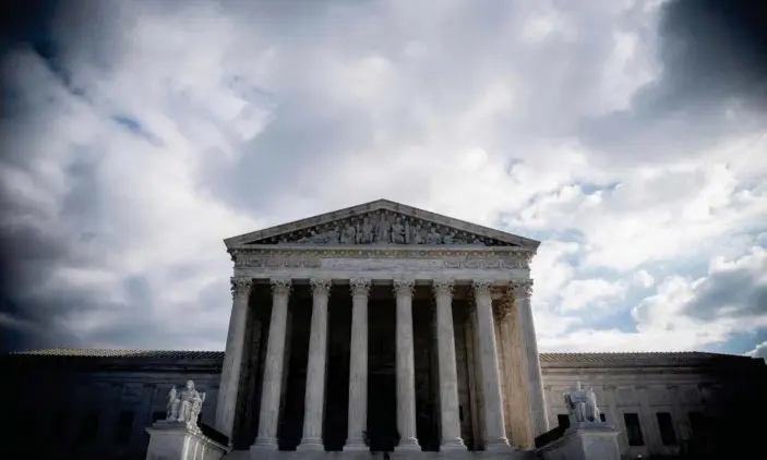  ?? Photograph: Eric Baradat/AFP/Getty Images ?? Joe Biden has not said whether he supports expanding the supreme court.