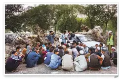  ?? AP ?? Displaced Afghans wait for food donations at a camp for internally displaced persons in Kabul.