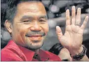  ?? REUTERS ?? Philippine senator and retired boxing icon Manny Pacquiao waves to his supporters in Pasay City, Metro Manila.