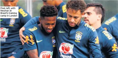  ??  ?? Fred, left, with Neymar at Brazil’s training camp in London