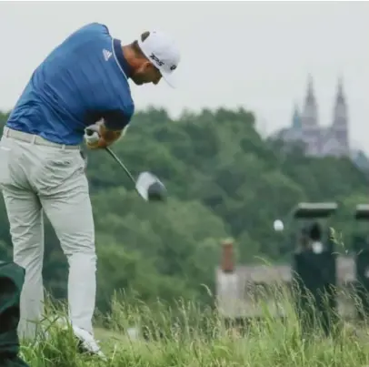  ??  ?? ERIN: Dustin Johnson drives on the 18th hole during the second round of the US Open golf tournament Friday, at Erin Hills in Erin, Wis.— AP