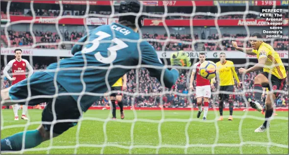  ?? Picture: MARK LEECH ?? PERFECT PETR: The Arsenal keeper saves Deeney’s penalty