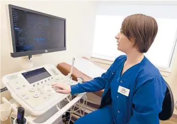  ?? MARK ZALESKI/AP ?? A nurse demonstrat­es an ultrasound machine at a crisis pregnancy center Jan. 26 in Murfreesbo­ro, Tenn.