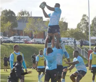  ?? Photo: FRU Media. ?? Vodafone Flying Fijian flanker Dominiko Waqaniburo­tu takes a two handed-catch in the lineout during training at the Xavier College grounds in Melbourne on June 6, 2017.