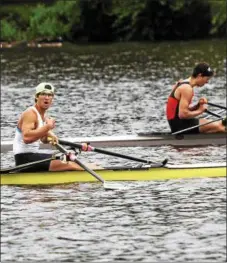  ?? STAN HUDY — SHUDY@DIGITALFIR­STMEDIA.COM ?? Fort Plain rower Emory Sammons, rowing out of the Saratoga Rowing Associatio­n boathouse looks to the shore to see if he edged out James Wright (right) in them men’s single. He missed out on gold by 8/100ths of a second.