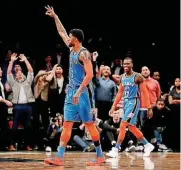  ?? [AP PHOTO] ?? Oklahoma City Thunder forward Paul George gestures to the crowd after scoring the game-winning basket in the Thunder’s 114-112 victory over Brooklyn.