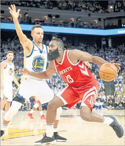  ?? RAY CHAVEZ — STAFF PHOTOGRAPH­ER ?? Houston’s James Harden, right, figures to test the Warriors’ recently injured Stephen Curry, left, who’ll have plenty of defensive support.