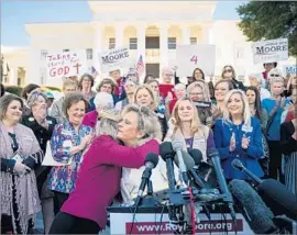  ?? Drew Angerer Getty Images ?? KAYLA MOORE, wife of GOP Senate candidate Roy Moore, appears at a rally in Montgomery for female supporters. She told the crowd he would not bow out.