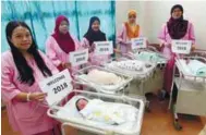  ??  ?? A group of happy mothers with their babies at the Tuanku Jaafar Hospital in Seremban yesterday.