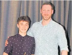  ??  ?? ● Llifon Torr had his Young Player award presented by former Wales internatio­nal Alan Duppa.