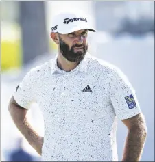  ?? EMIL LIPPE/AP ?? Dustin Johnson looks at the green before putting on the 18th hole during the first round of the AT&T Byron Nelson golf tournament in McKinney, Texas, on Thursday.