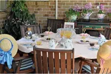  ??  ?? An outdoor table set for a family affair.