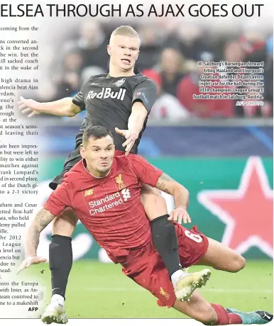  ?? AFP AFP PHOTO ?? Salzburg’s Norwegian forward Erling Haaland and Liverpool’s Croatian defender Dejan Lovren (right) vie for the ball during the UEFA Champions League Group E football match in Salzburg, Austria.