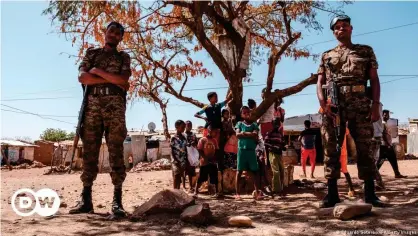  ??  ?? Eritrean refugees who had fled the authoritar­ian state to camps in Tigray are uniquely vulnerable with Eritrean soldiers still present in the region. These are Ethiopian army soldiers standing guard.