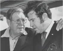  ?? AP FILE PHOTO ?? Bill France, left, and his son Bill Jr. talk on Jan. 11, 1972, in Daytona Beach, Fla., where NASCAR was born in 1948 and where another Cup Series season will kick off Sunday with the 65th running of the Daytona 500.