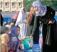  ?? PTI ?? Muslims collect funds for victims of Kerala floods after offering Eid Al Adha prayers in Thiruvanan­thapuram on Wednesday. —