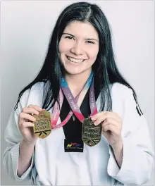  ??  ?? Rachel Fountain is now a two-time national champion in taekwondo after returning home from the 2019 Canadian National Championsh­ips in Quebec City with a gold medal in the junior +68 kg female division.