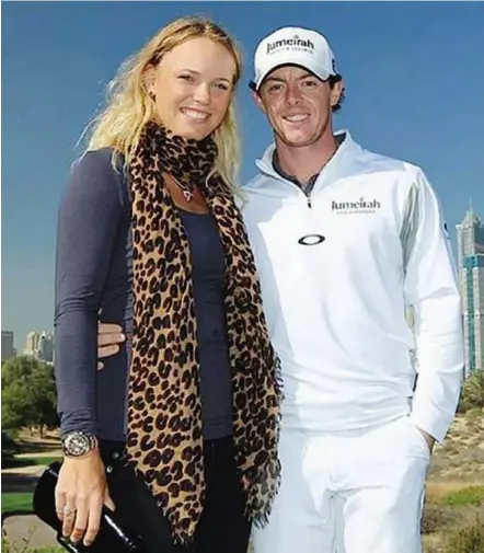  ??  ?? Perfect match: Tennis superstar Caroline Wozniacki and rising golfer Rory Mcilroy support each other in their respective career.