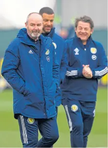  ??  ?? It’s all smiles for Steve Clarke and his coaches, Steven Reid and John Carver