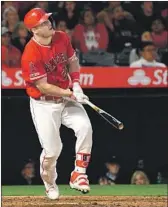  ?? Jayne Kamin-Oncea Getty Images ?? MIKE TROUT hits a go-ahead homer in the sixth.