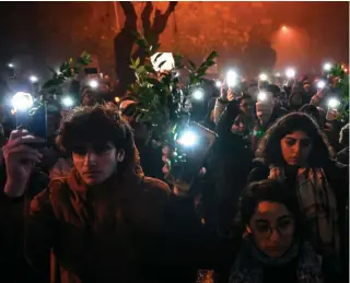  ?? AFP PHOTO ?? THOSE LEFT BEHIND
People raise their mobile phones, with their flashlight­s turned on, during a vigil in the city of Antakya, southern Turkey, to mark the first anniversar­y of the earthquake­s on Tuesday, Feb. 6, 2024.