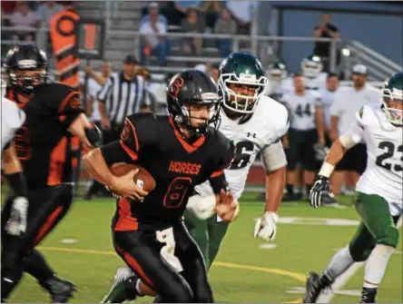  ?? PHOTOS BY NICK TOPPING — NTOPPING@DIGITALFIR­STMEDIA.COM ?? Stratton Sherman runs the ball in for a touchdown during Schuylervi­lle’s 42-6 win over Hudson Falls on Friday. Sherman had three rushing touchdowns in the game.