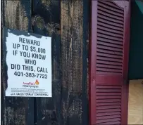  ?? Photo by Joseph B. Nadeau ?? A sign on the outside wall at Coffee & Cream offers a reward for informatio­n on the suspected arson fire.