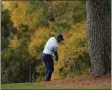  ?? MATT SLOCUM - THE ASSOCIATED PRESS ?? Dustin Johnson hits out of the rough on the third fairway during a practice round for the Masters golf tournament Monday, Nov. 9, 2020, in Augusta, Ga.