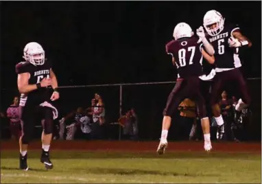  ?? BILL RUDICK — FOR DIGITAL FIRST MEDIA ?? Justin Neskie and Tim Faber celebrate Faber’s touchdown Friday night.