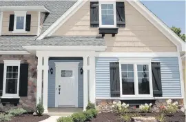  ??  ?? Door and window trim builds up a home’s style and appeal. Architectu­ral polyuretha­ne products are easy to install.