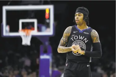  ?? Matt Slocum / Associated Press ?? Golden State’s D’Angelo Russell, whose rookie season with the Lakers was Kobe Bryant’s final season in the NBA, paced the Warriors, scoring 28 against the Sixers. “It didn’t feel like it was a game,” he said.