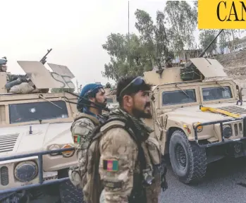  ?? DANISH SIDDIQUI / REUTERS ?? A convoy of Afghan Special Forces is seen during a rescue mission of a policeman who was
surrounded by Taliban fighters at a checkpost in Kandahar province on July 13.