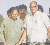  ?? SHASHI S KASHYAP/ HT PHOTO/PTI ?? Shiv Sena chief Uddhav Thackeray (left) with party MLA and son Aaditya Thackeray; Congress leader Ahmed Patel with NCP chief Sharad Pawar, in Mumbai on Tuesday.