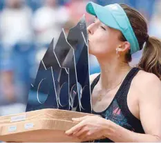  ??  ?? France’s Alize Cornet with Gstaad WTA trophy.