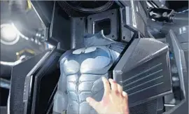  ?? Warner Bros. Interactiv­e Entertainm­ent ?? FOR SOME, donning the suit in “Batman: Arkham VR” is a dream come true.