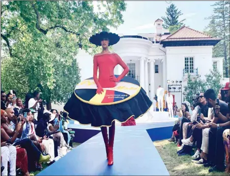  ??  ?? The latest fashion from Pyer Moss is modeled Saturday July 10, in Irvington, N.Y., and staged at the Villa Lewaro mansion, the home built by African American entreprene­ur Madam C.J. Walker in 1917. (AP)