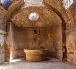  ?? ?? LAVISH BATHHOUSES were a common fixture of society in ancient Rome, giving citizens of all classes the chance to soak and socialize.