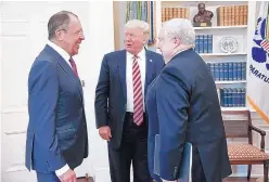  ?? SOURCE: RUSSIAN FOREIGN MINISTRY ?? President Donald Trump meets with Russian Foreign Minister Sergey Lavrov, left, next to Russian Ambassador to the U.S. Sergey Kislyak at the White House on May 10.