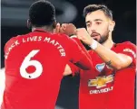  ??  ?? Paul Pogba and Bruno Fernandes