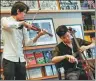  ?? MARY ALTAFFER / AP ?? Artists give a performanc­e during the press preview at the Museum of Chinese in America on Wednesday in New York.