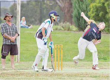  ??  ?? Longwarry’s Erin Maxwell bowls in Division 6 against Yarragon. She finished with figures of 2/35 from her five overs.