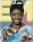  ?? Foto: afp ?? Die erfolgreic­hste Turnerin aller Zeiten: Nach vier Olympiasie­gen gewann Simone Biles ihren 13. WM-Titel.