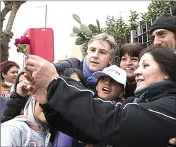  ?? FOTOS CEDOC PERFIL ?? EN CAMPAÑA. El Presidente Macri vino a Córdoba a apoyar a su candidato Baldassi. Martín Llaryora encabezó la lista de Unión por Córdoba.