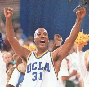  ?? AP FILE PHOTO BY ERIC DRAPER ?? Ed O’Bannon celebrates after UCLA won the NCAA title in 1995. He sued the NCAA alleging antitrust violations over NIL.