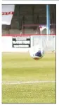  ??  ?? SPOT ON: Jake McCarthy fires in Weymouth’s second penalty kick