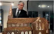  ?? KIRK HARGREAVES/STUFF ?? With a copper model of the Christ Church Cathedral in 2014. He fought hard to get the cathedral repaired.