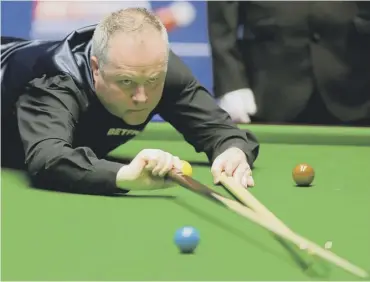  ??  ?? 0 John Higgins was able to keep in touch with Judd Trump in the first session of their quarter-final.